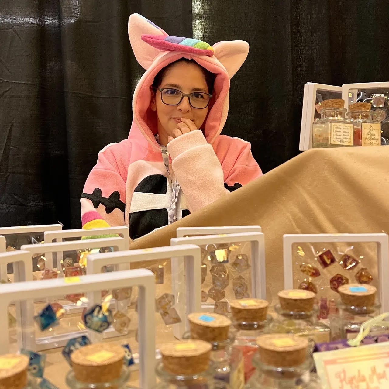 owner and dice display at an event